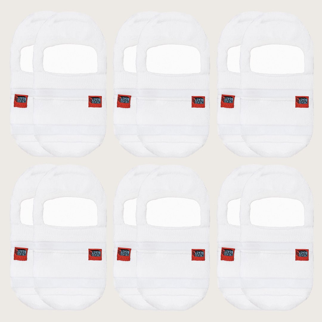 Six pairs of white Crease Beast Pocket Socks, each with a red Crease Beast label, front view.