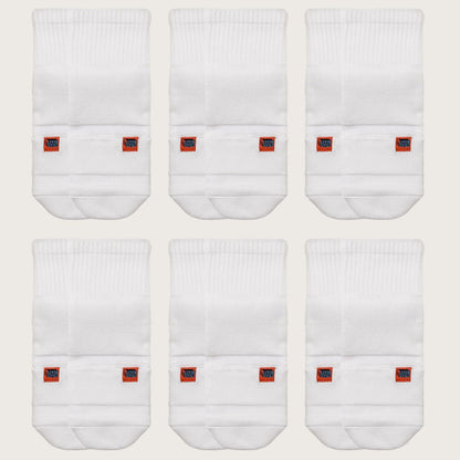 Six pairs of white Crease Beast Pocket Socks - Ankle, each with an orange Crease Beast label, front view.