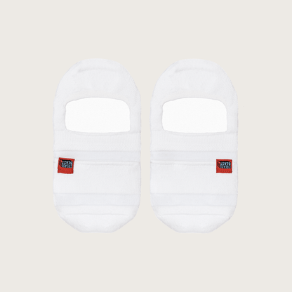 Front view of two white CREASE BEAST POCKET SOCKS - NO SHOW, each with a red CREASE BEAST label.